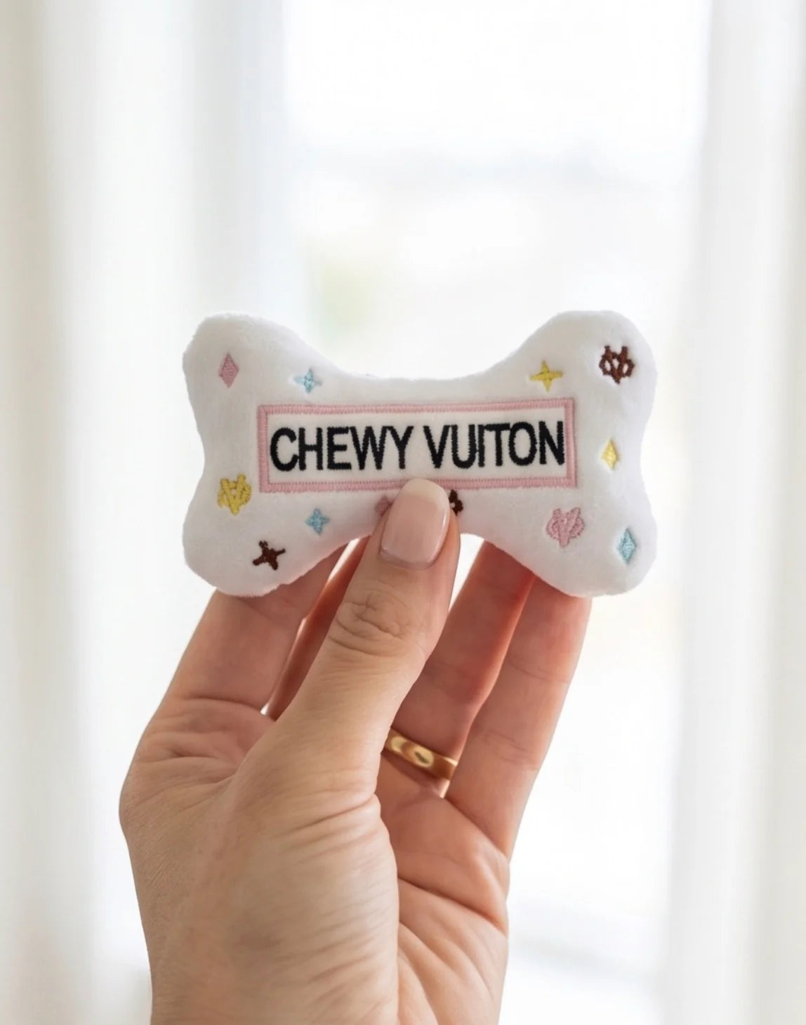 White Chewy Vuiton Bones Squeaker Dog Toy